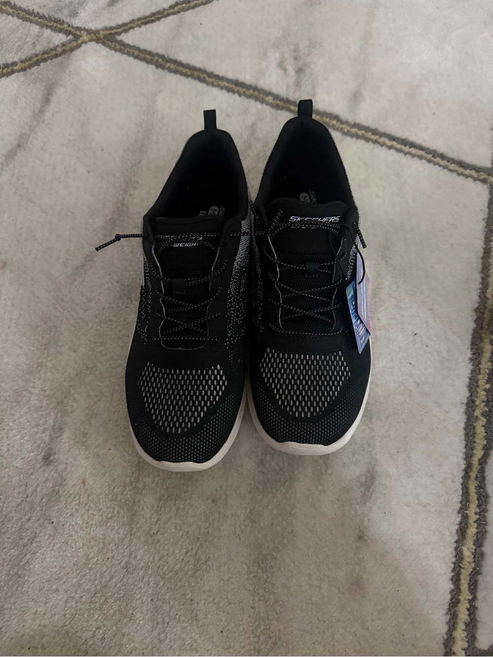 Skechers Black and White Knit Memory Foam Sneakers